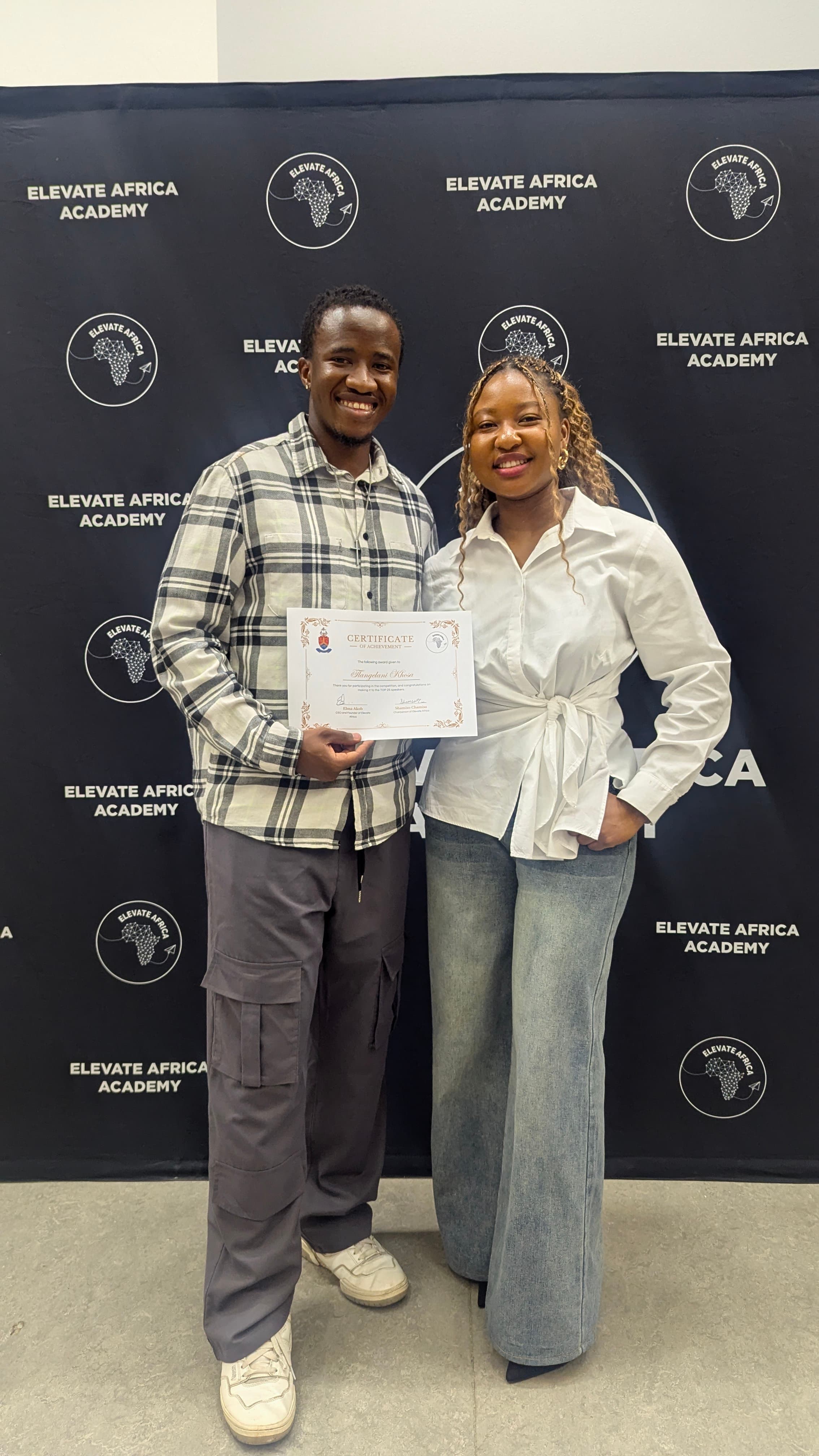 TK receiving a Top 25 Speakers award from Elevate Africa Academy