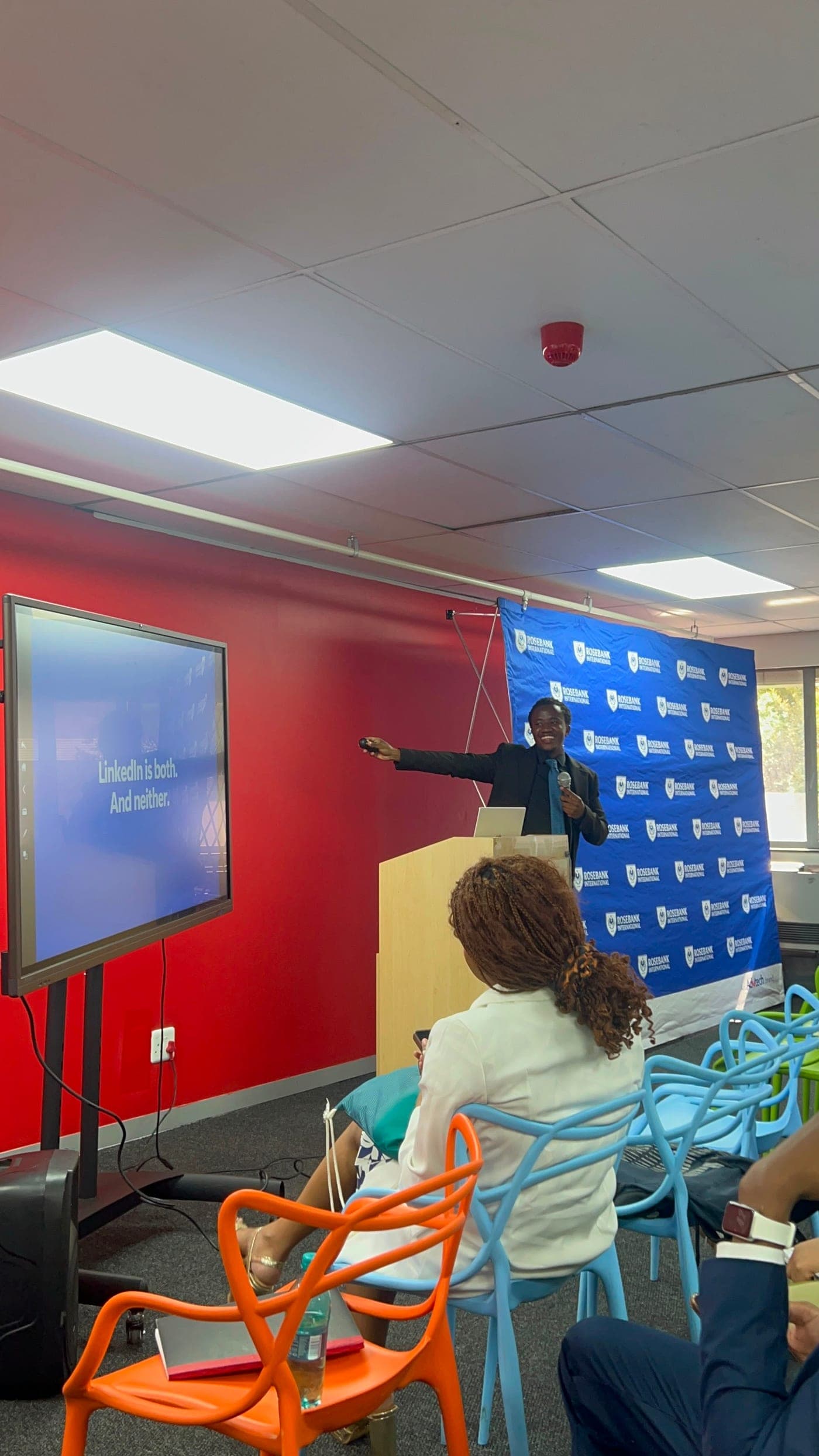TK presenting to students at Rosebank International