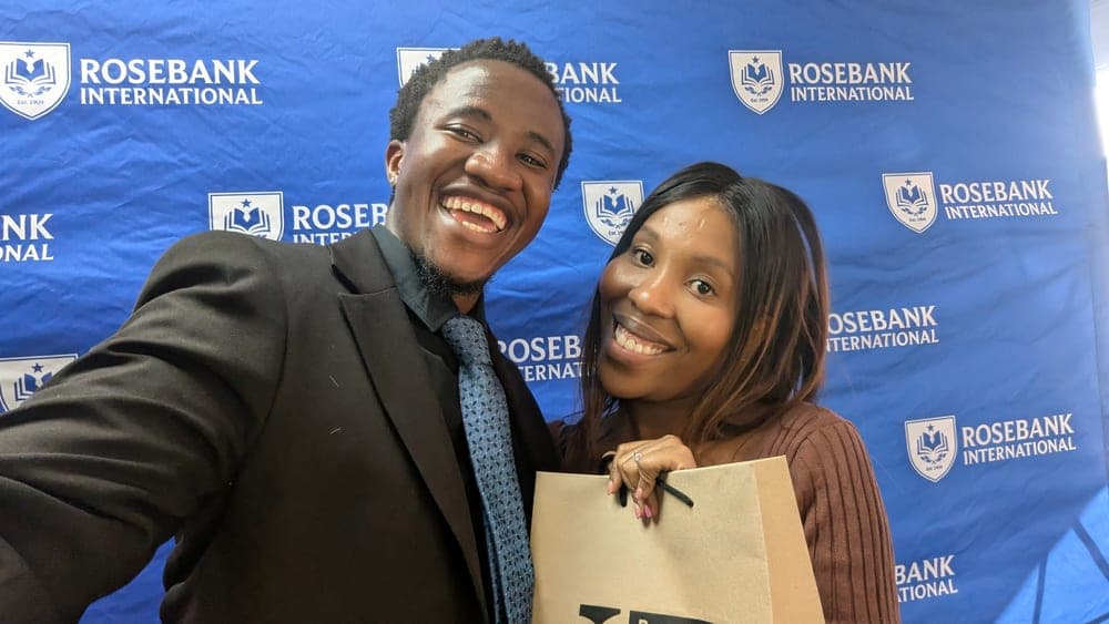 TK with a lecturer at Rosebank International